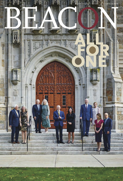 A group of people stands on the steps of an ornate building with large wooden doors. The word "BEACON" and the phrase "ALL FOR ONE" are written above them. The setting appears formal and collegiate.