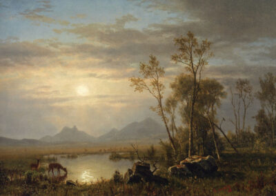 A serene landscape painting features a calm lake reflecting the sky's soft light at either sunrise or sunset. Deer graze by the water, surrounded by sparse trees and distant mountains under a partly cloudy sky.